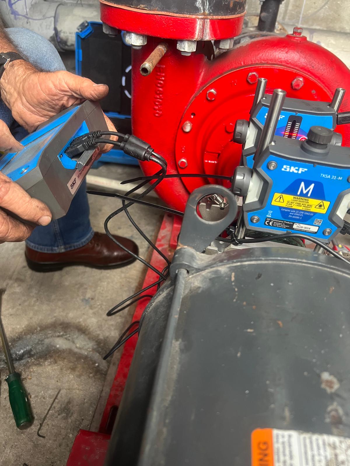 SKF laser shaft alignment equipment in field use on HVAC/R rotating equipment
