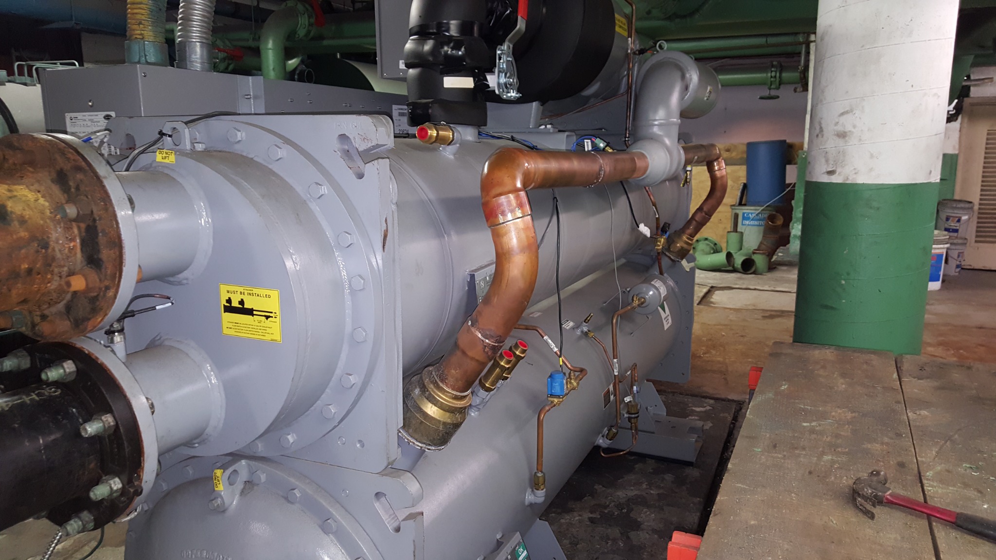 Large Carrier liquid chiller in a mechanical room